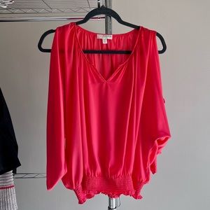 Orange open shoulder blouse